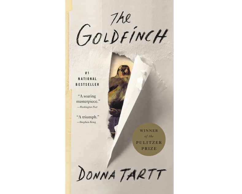 Cover of The Goldfinch: tear in paper with goldfinch bird peeking through